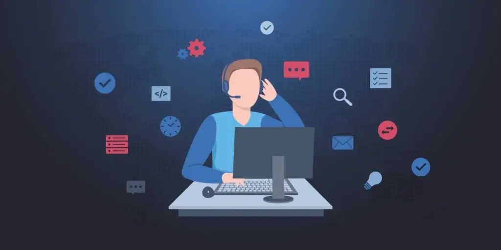 IT Worker on a PC representing unified IT operations management