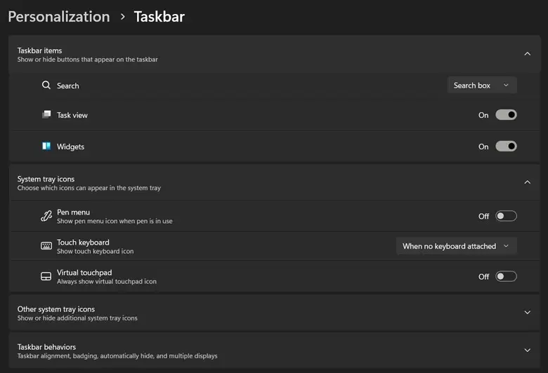 Personalización > Barra de tareas: activa o desactiva el icono del touchpad virtual